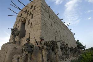 U.S. soldiers from 5-20 infantry Regiment attached to 82nd Airborne enter a barn while on patrol in Zharay district in Kandahar province, southern Afghanistan April 26, 2012. REUTERS/Baz Ratner (AFGHANISTAN - Tags: MILITARY)
