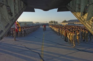 English/Anglais AR2006-G047-0021 30 November 2006 Kandahar, Afghanistan On a brisk November morning, members of Canadian Joint Task Force Afghanistan (JTF-AFG) and a delegation of the British, American, Dutch, Danes, Romanians, and the Canadian Forces Personnel Support Agency (CFPSA) pay their final respects during a ramp ceremony for Cpl Albert Storm and CWO Robert Girouard before their final journey from the Kandahar Airfield, Afghanistan. Cpl Storm and CWO Girouard were killed by a suicide vehicle born improvised explosive device (SVBIED) on Monday morning. Photo by: MCpl Yves Gemus Task Force Afghanistan Roto 2 Imagery Technician French/Franais AR2006-G047-0021 30 novembre 2006 Kandahar (Afghanistan) Par un matin frisquet de novembre, des membres de la Force oprationnelle en Afghanistan (FOA), une dlgation des contingents britannique, amricain, nerlandais, danois et roumain ainsi que des reprsentants de lÕAgence de soutien du personnel des Forces canadiennes (ASPFC) se sont runis sur le tarmac du terrain dÕaviation de Kandahar, en Afghanistan. Ils venaient rendre un dernier hommage au Cpl Albert Storm et  lÕAdjuc Robert Girouard avant quÕils ne sÕenvolent pour leur dernier voyage. Le Cpl Storm et lÕAdjuc Girouard ont t tus dans un attentat-suicide  la voiture pige (SVBIED). Photo : Cplc Yves Gemus Force oprationnelle en Afghanistan, ROTO 2 Technicien en imagerie
